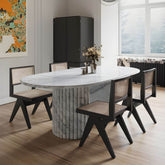 Modern oval marble dining table with white double pedestal base for stylish dining rooms